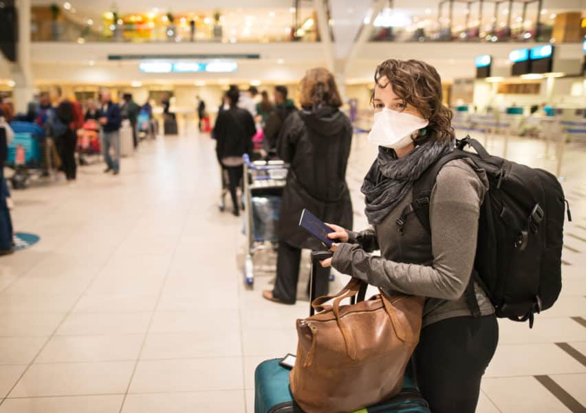 airport face mask_iStock1215339540_credit AJ_Watt ACI World Insights