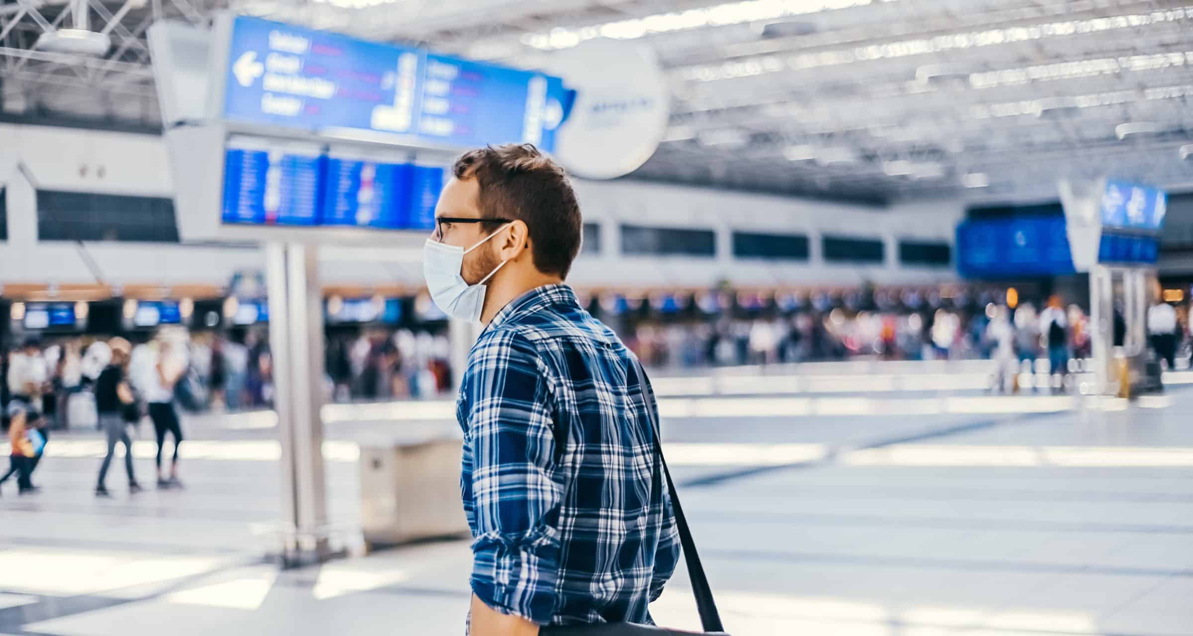 Airport,European,Nerd,Man,In,Glasses,And,Plaid,Shirt,With